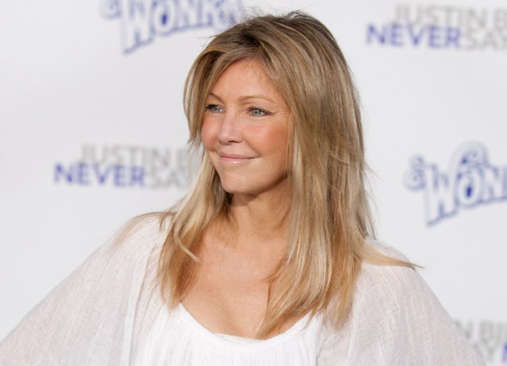 50 plus vrouw Heather Locklear met lang haar