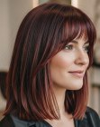 Steil wijnrood haar met highlights