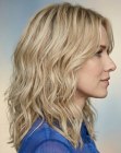 Lang blond haar met golven