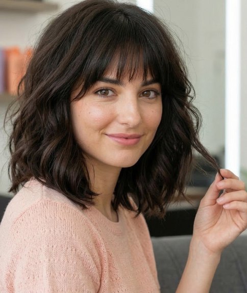 Schouderlang golvend haar